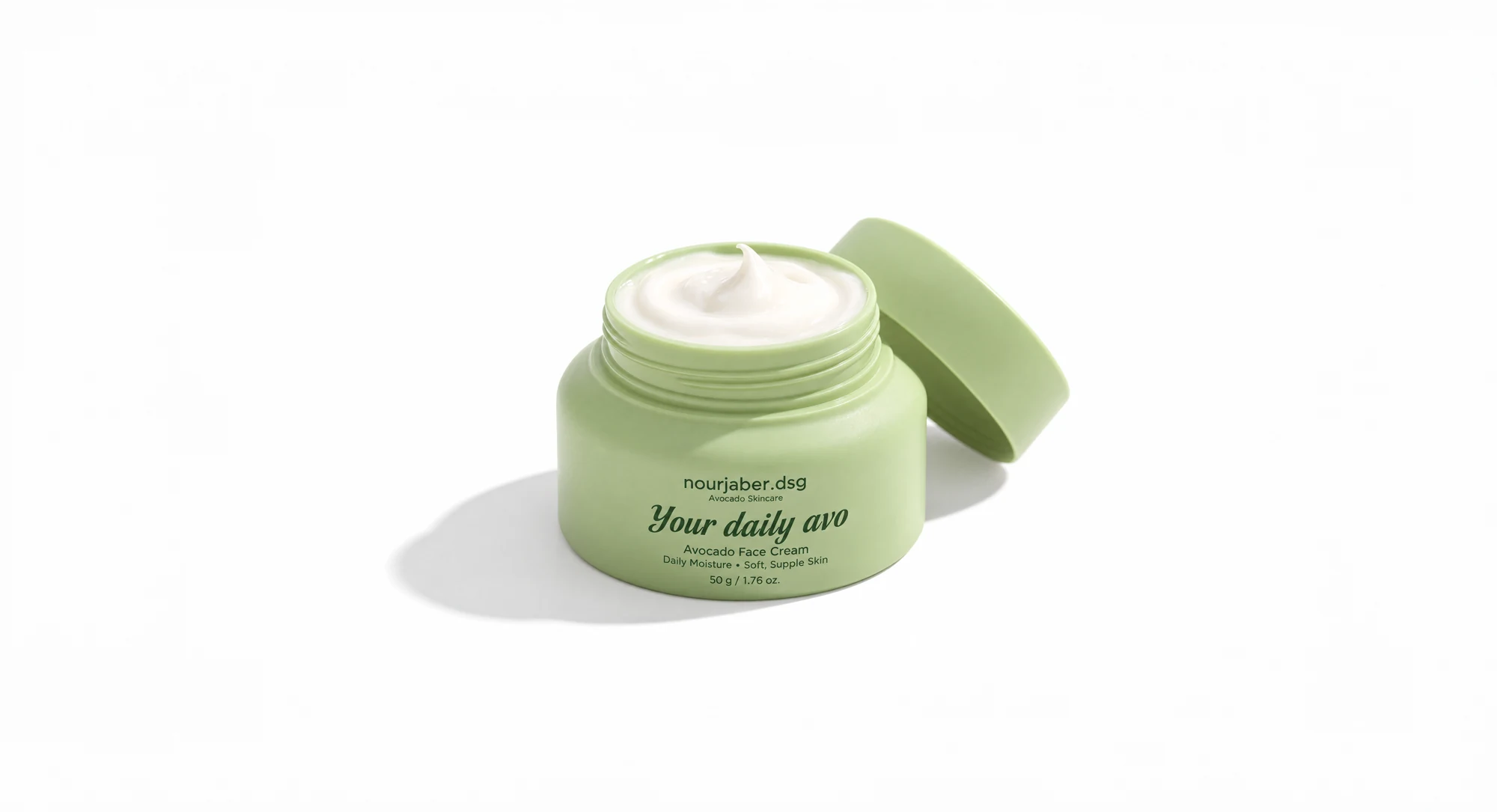 Open pastel-green Your Daily Avo face cream jar on a white studio background